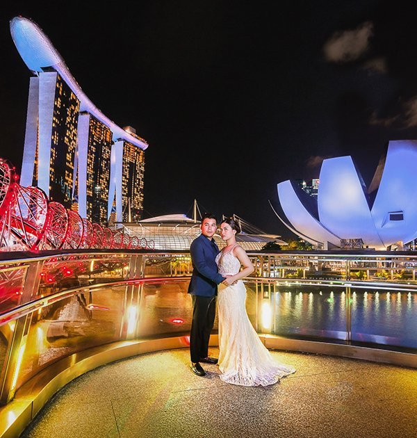 Couple dressed for a destination pre-wedding portrait in Singapore