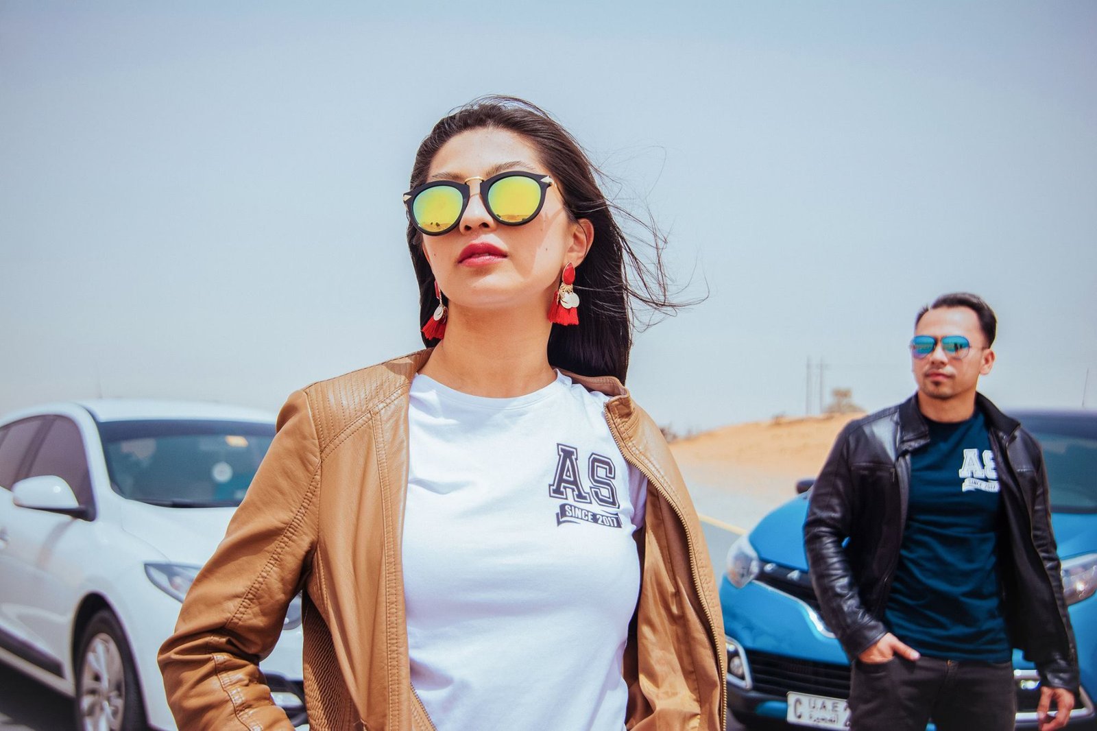 A confident editorial fashion portrait with a bold, contemporary styling look